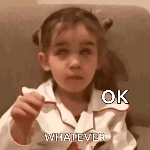 a little girl is sitting on a couch with her eyes closed and holding a piece of paper that says whatever .