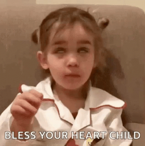 A Little Girl Is Sitting On A Couch With Her Eyes Closed And The Words `` Bless Your Heart Child '' Written On The Scree GIF