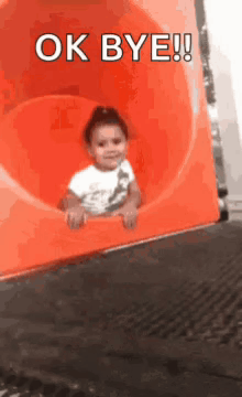 A Little Girl Is Sitting On A Slide With The Words Ok Bye Written Above Her GIF