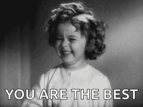 A Little Girl Is Smiling In A Black And White Photo And Saying `` You Are The Best '' . GIF
