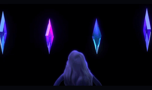 A Little Girl Is Standing In Front Of A Row Of Crystals GIF