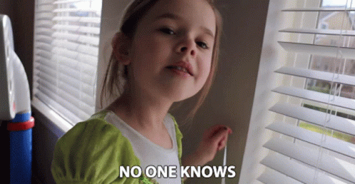 A Little Girl Looking Out A Window With The Words No One Knows Written On The Bottom GIF