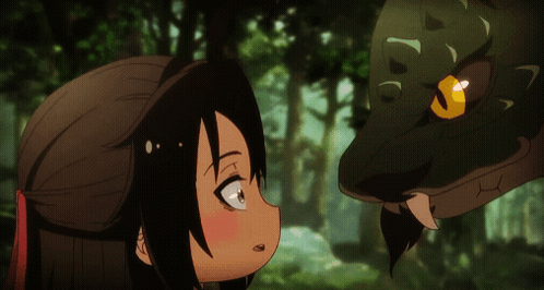 A Little Girl Looks At A Snake With A Yellow Eye GIF