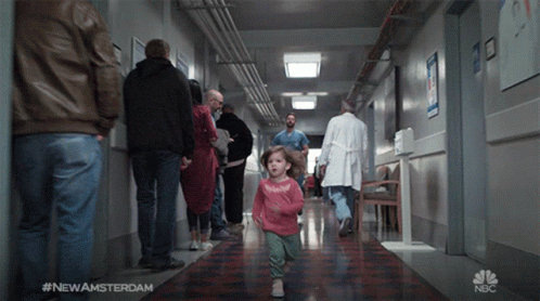 A Little Girl Running Down A Hospital Hallway With #Newamsterdam GIF