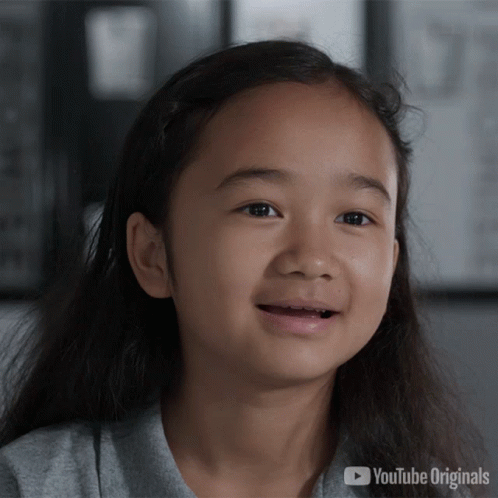 A Little Girl 'S Face Is Shown In A Youtube Originals Ad GIF