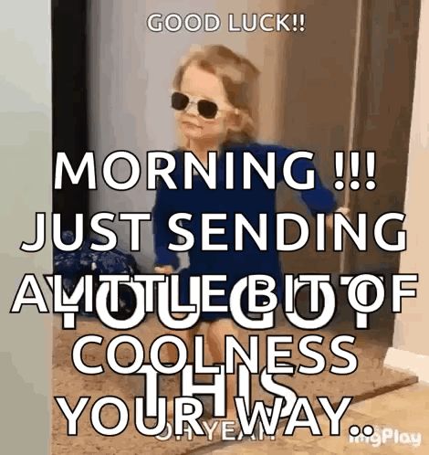 a little girl wearing sunglasses and a blue dress says good luck