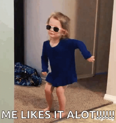 A Little Girl Wearing Sunglasses And A Blue Dress Says Me Likes It Alot !!! GIF