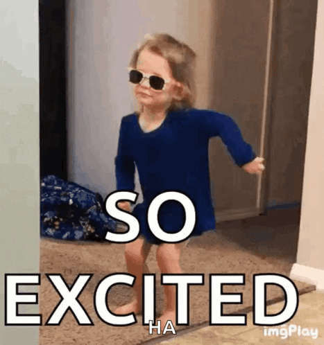 A Little Girl Wearing Sunglasses And A Blue Shirt Says So Excited Ha GIF