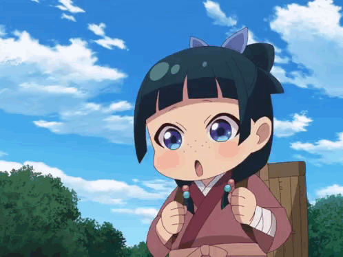 a little girl with a bow in her hair stands in front of a blue sky with clouds