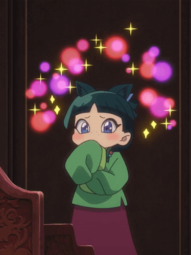 Girl With Cat Ears Surrounded By Glowing Lights GIF