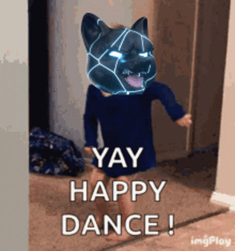 A Little Girl With A Cat Mask On Her Head Says Yay Happy Dance ! GIF