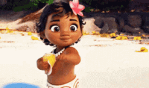A Little Girl With A Flower In Her Hair Is Standing On The Beach . GIF