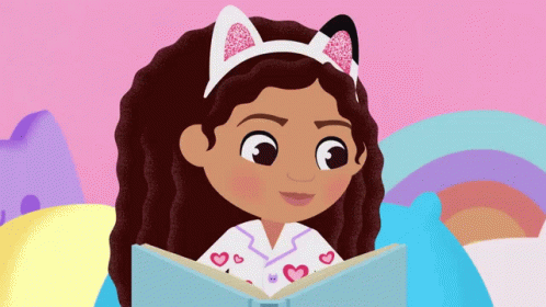 A Little Girl With Cat Ears Is Reading A Book GIF