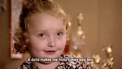 A Little Girl With Curly Hair Is Smiling And Says `` A Dolla Makes Me Holla Honey Boo Boo . '' GIF