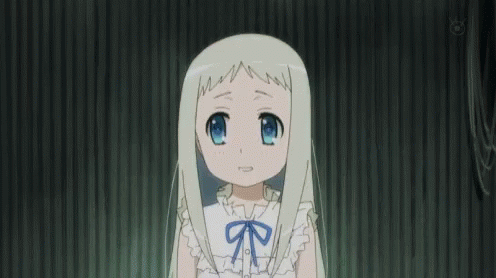 A Little Girl With Long White Hair And A Blue Bow On Her Shirt Is Smiling . GIF