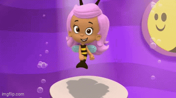 A Little Girl With Pink Hair And A Bee Outfit Is Standing On A Purple Surface . GIF