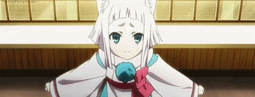 A Little Girl With White Hair And Blue Eyes Is Wearing A Cat Costume And Standing In A Room . GIF