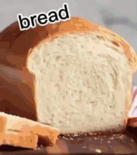 A Loaf Of Bread With The Word Bread Written On Top GIF