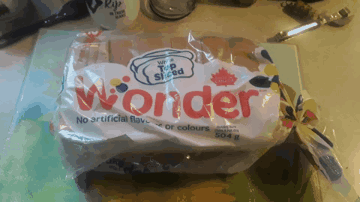 A Loaf Of Wonder Bread Sits On A Counter GIF