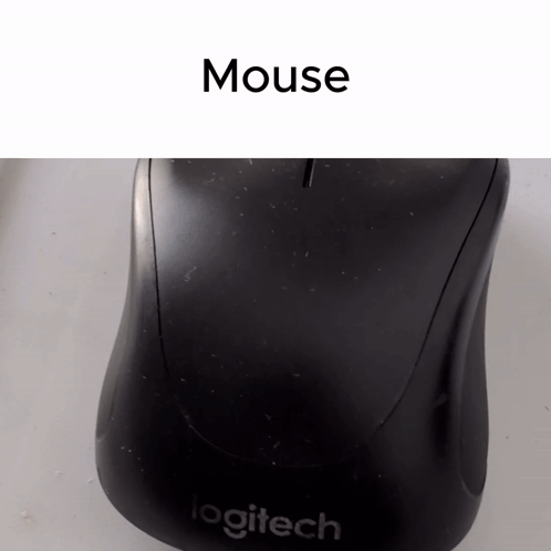 A Logitech Mouse Sits On A White Table GIF