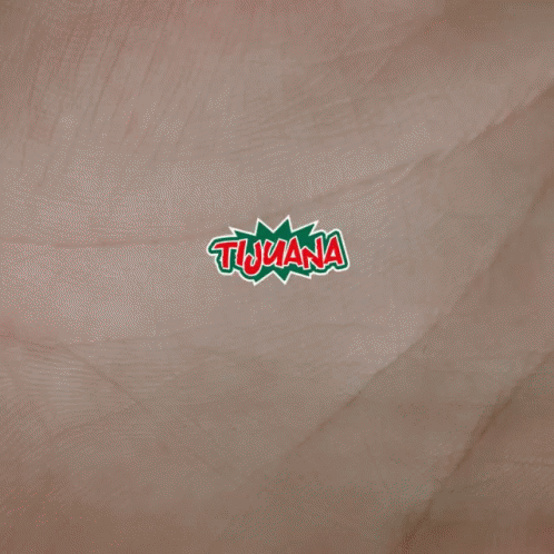 A Logo For Tijuana Is Displayed On A Brown Surface GIF