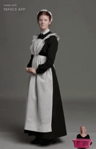 A Maid In A Black And White Dress Is Made With Reface App GIF