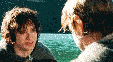 A Man And A Boy Are Looking At Each Other In Front Of A Lake GIF