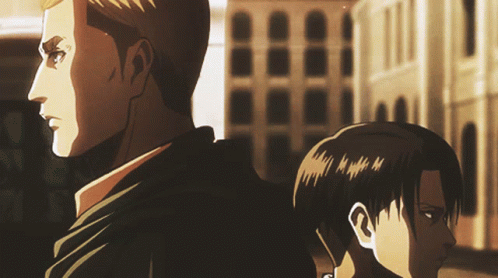 A Man And A Boy Are Standing Back To Back In Front Of A Building GIF