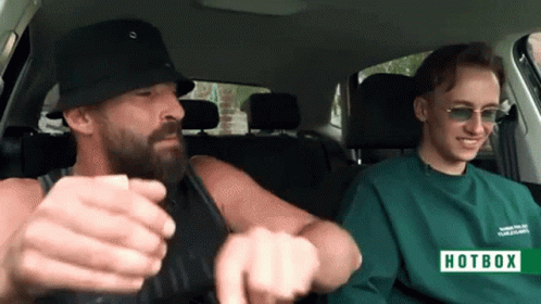 A Man And A Boy In A Car With A Hotbox Sign GIF