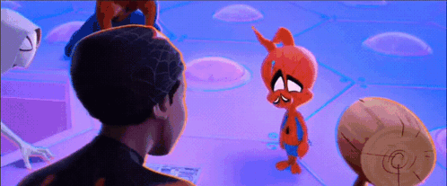 A Man And A Cartoon Character Are Standing Next To Each Other On A Blue Background . GIF