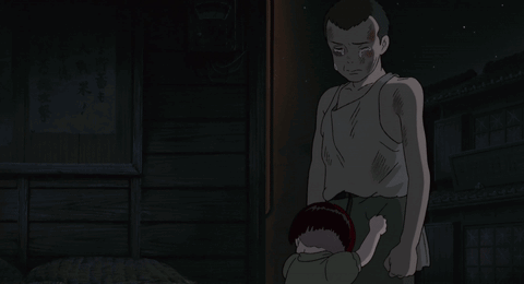 A Man And A Child Are Standing In A Dark Room With Chinese Writing On The Wall GIF