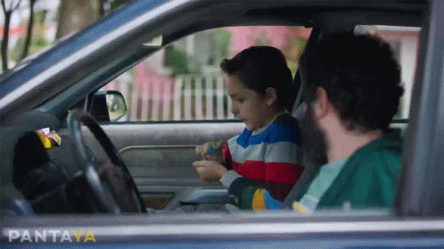 A Man And A Child In A Car With Pantaya Written On The Bottom Left GIF