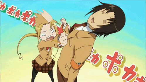 a man and a girl are fighting in a cartoon with foreign writing