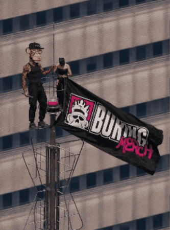 A Man And A Monkey Holding A Burning Merch Flag On Top Of A Building GIF