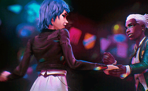 A Man And A Woman Are Dancing In A Dark Room GIF