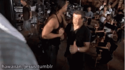 A Man And A Woman Are Dancing In A Room With Hawaiian Jesus Tumblr Written On The Bottom GIF