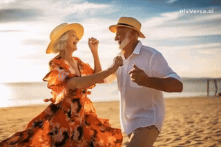 A Man And A Woman Are Dancing On A Beach GIF
