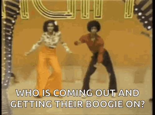 A Man And A Woman Are Dancing On A Stage . GIF
