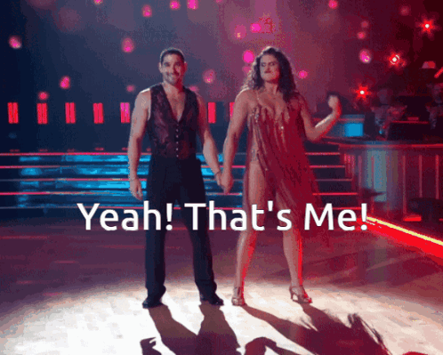A Man And A Woman Are Dancing On A Stage With The Words Yeah That 'S Me GIF