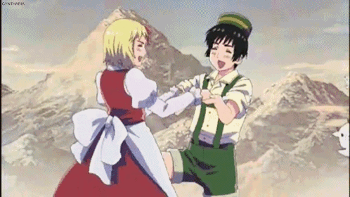A Man And A Woman Are Dancing Together In Front Of A Mountain . GIF