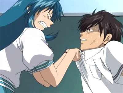 A Man And A Woman Are Fighting Each Other In A Classroom GIF