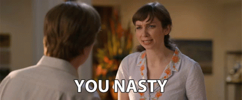 A Man And A Woman Are Having A Conversation And The Woman Is Saying You Nasty GIF