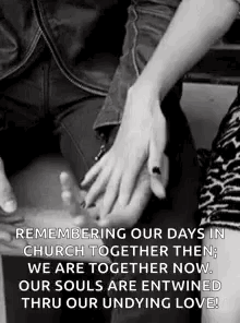 A Man And A Woman Are Holding Hands In A Black And White Photo . GIF