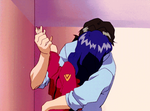 A Man And A Woman Are Hugging And The Woman Has A Chevron On Her Jacket GIF