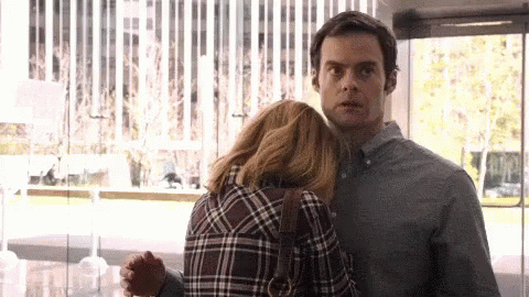 Man And Woman Hugging Woman In Plaid Shirt GIF