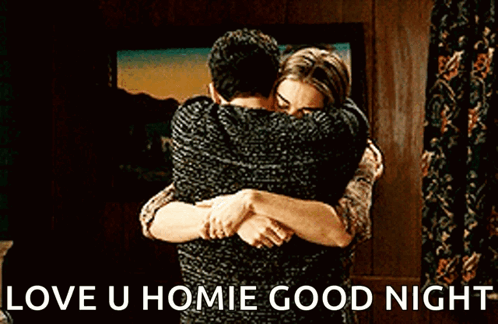 A Man And A Woman Are Hugging Each Other In A Room With The Words `` Love U Homie Good Night '' . GIF