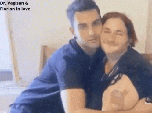 A Man And A Woman Are Hugging Each Other With The Caption Dr. Vagisan And Florian In Love GIF