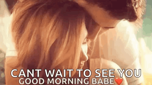 A Man And A Woman Are Kissing And Hugging Each Other . GIF