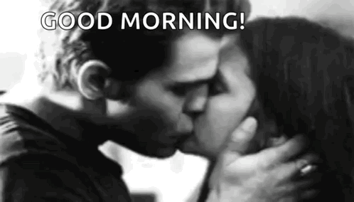 A Man And A Woman Are Kissing In A Black And White Photo With The Words `` Good Morning ! '' GIF