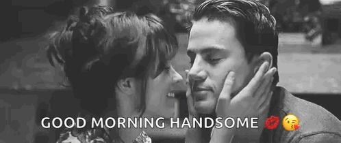 A Man And A Woman Are Kissing In A Black And White Photo With The Words `` Good Morning Handsome '' . GIF